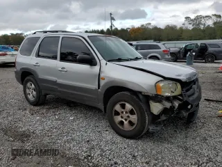 2003 Mazda Tribute LX with VIN 4F2YZ04153KM20941, listed as a Copart auction lot 82683264 with 195,240 mi miles and Salvage Title. Bid and sale history available at DreamBid. Image 4.