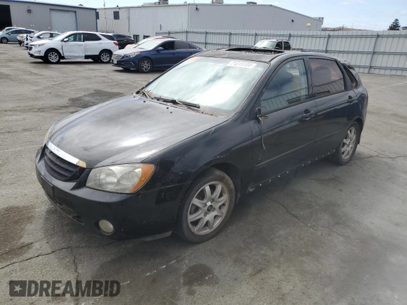 2005 Kia Spectra with VIN KNAFE162655074198, listed as a Copart auction lot 71015104 with 200,819 mi miles and Salvage Title. Bid and sale history available at DreamBid. Image 1.