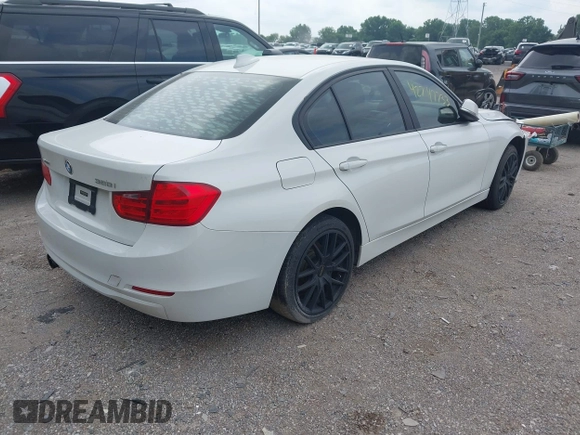 2013 BMW 3 Series 328i xDrive with VIN WBA3B5C5XDJ598557, listed as a IAAI auction lot 42747733 with 153,989 mi miles and . Bid and sale history available at DreamBid. Image 4.