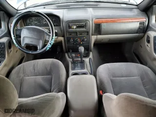 1999 Jeep Grand Cherokee Laredo with VIN 1J4GW58N6XC784679, listed as a Copart auction lot 85345304 with 234,584 mi miles and Salvage Title. Bid and sale history available at carsss.com. Image 8.