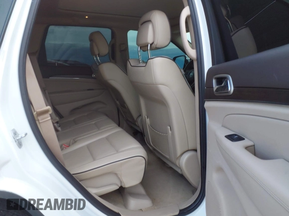 2016 Jeep Grand Cherokee Overland with VIN 1C4RJFCG2GC490420, listed as a IAAI auction lot 42200700 with 97,007 mi miles and . Bid and sale history available at DreamBid. Image 8.