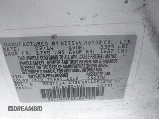 2014 Nissan Versa SV with VIN 3N1CN7AP0EL869083, listed as a IAAI auction lot 42044279 with 143,568 mi miles. Bid and sale history available at carsss.com. Image 9.