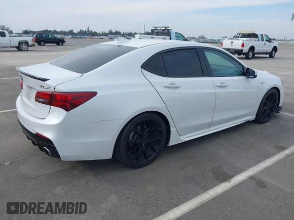 2019 Acura TLX w/A-Spec Pkg with VIN 19UUB1F60KA006344, listed as a IAAI auction lot 41429268 with 113,805 mi miles. Bid and sale history available at carsss.com. Image 4.