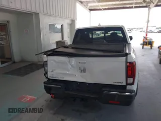 2020 Honda Ridgeline RTL-E with VIN 5FPYK3F71LB005028, listed as a IAAI auction lot 42167883 with 81,882 mi miles and . Bid and sale history available at DreamBid. Image 16.