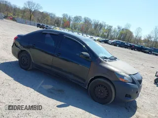 2009 Toyota Yaris with VIN JTDBT903294057773, listed as a IAAI auction lot 42071027 with 164,128 mi miles. Bid and sale history available at carsss.com. Image 1.