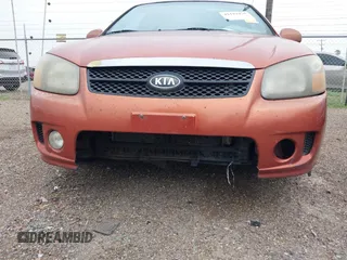 2009 Kia Spectra Spectra5 z VIN KNAFE241995024725, wystawiony jako IAAI lot #42193430 z przebiegiem 228 088 mil mil oraz . Historia ofert i sprzedaży dostępna na DreamBid. Obrazek 6.