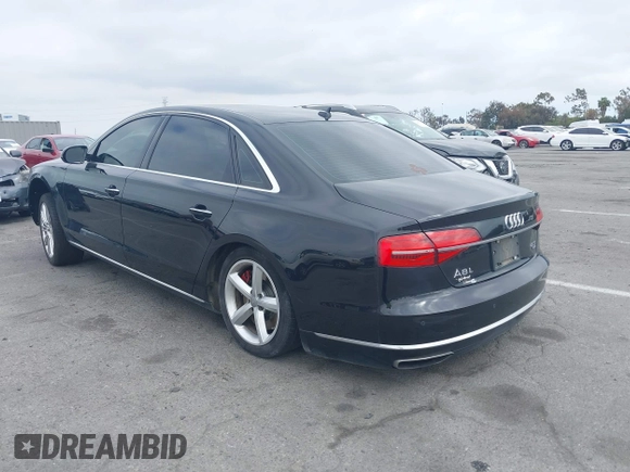 2015 Audi A8 L 4.0T with VIN WAU32AFD4FN033471, listed as a IAAI auction lot 42120112 with 174,882 mi miles. Bid and sale history available at carsss.com. Image 3.