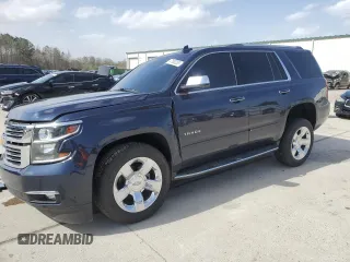 2017 Chevrolet Tahoe Premier with VIN 1GNSCCKC9HR335460, listed as a Copart auction lot 47653205 with 100,743 mi miles and Salvage title. Bid and sale history available at DreamBid. Image 1.