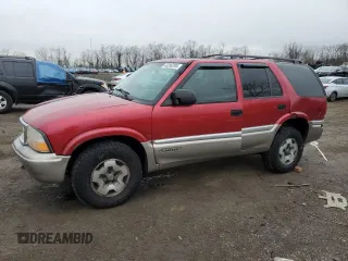 2001 GMC Jimmy SLE with VIN 1GKDT13W012159836, listed as a Copart auction lot 43290295 with 128,833 mi miles and Salvage Title. Bid and sale history available at carsss.com. Image 1.