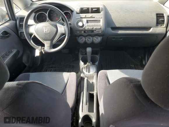 2007 Honda Fit z VIN JHMGD38447S026125, wystawiony jako Copart lot #56554145 z przebiegiem 227 284 mil mil oraz Szkoda całkowita • Salvage title. Historia ofert i sprzedaży dostępna na DreamBid. Obrazek 8.