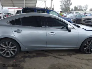 2017 Mazda Mazda6 Touring with VIN JM1GL1V59H1122054, listed as a IAAI auction lot 41896616 with 114,422 mi miles. Bid and sale history available at carsss.com. Image 14.
