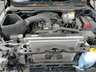 2019 Ram 1500 Rebel z VIN 1C6SRFET6KN796285, wystawiony jako Copart lot #60970545 z przebiegiem 63 425 mil mil oraz Szkoda całkowita • Salvage title. Historia ofert i sprzedaży dostępna na DreamBid. Obrazek 13.