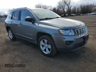 2012 Jeep Compass Sport with VIN 1C4NJDBB1CD562477, listed as a Copart auction lot 50935955 with 79,619 mi miles and Salvage Title. Bid and sale history available at carsss.com. Image 4.