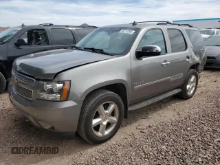 2012 Chevrolet Tahoe LTZ with VIN 1GNSKCE03CR286074, listed as a Copart auction lot 48717295 with 179,034 mi miles and Salvage title. Bid and sale history available at DreamBid. Image 1.