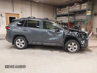 2021 Toyota RAV4 Hybrid XLE with VIN JTMRWRFV2MD125979, listed as a IAAI auction lot 41686695 with 79,737 mi miles. Bid and sale history available at carsss.com. Image 14.