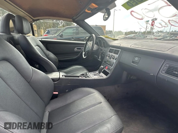2002 Mercedes-Benz SLK 230 Kompressor with VIN WDBKK49FX2F265220, listed as a Copart auction lot 79324194 with 90,860 mi miles and Clean title. Bid and sale history available at DreamBid. Image 6.