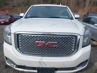 2016 GMC Yukon Denali with VIN 1GKS2CKJ9GR334645, listed as a IAAI auction lot 41781040 with 141,405 mi miles. Bid and sale history available at carsss.com. Image 6.