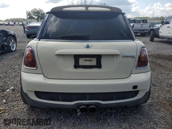 2010 MINI Hardtop S with VIN WMWMF7C5XATW89025, listed as a Copart auction lot 56106705 with 141,216 mi miles and Salvage title. Bid and sale history available at DreamBid. Image 6.