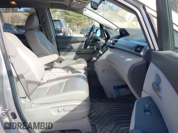 2012 Honda Odyssey Touring with VIN 5FNRL5H95CB063003, listed as a IAAI auction lot 41871975 with 179,332 mi miles and . Bid and sale history available at DreamBid. Image 5.
