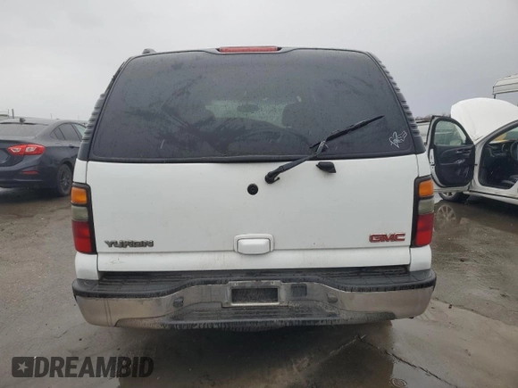 2004 GMC Yukon SLE with VIN 1GKEK13V64J228294, listed as a Copart auction lot 86573574 with 150,780 mi miles and Salvage Title. Bid and sale history available at carsss.com. Image 6.