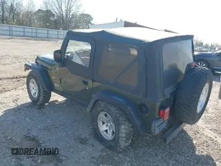 2006 Jeep Wrangler Rubicon z VIN 1J4FA69SX6P788424, wystawiony jako IAAI lot #41712349 z przebiegiem 121 684 mil mil oraz . Historia ofert i sprzedaży dostępna na DreamBid. Obrazek 3.