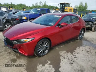 2019 Mazda Mazda3 Hatchback with VIN JM1BPBJM9K1140773, listed as a Copart auction lot 57002824 with 76,804 mi miles and Salvage Title. Bid and sale history available at carsss.com. Image 1.