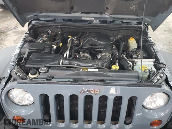 2013 Jeep Wrangler Unlimited Rubicon with VIN 1C4BJWFG7DL691514, listed as a Copart auction lot 42449245 with 114,640 mi miles and Salvage Title. Bid and sale history available at carsss.com. Image 12.
