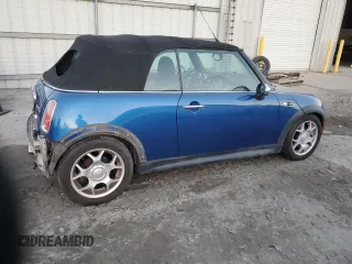 2006 MINI Convertible S with VIN WMWRH33526TL93206, listed as a Copart auction lot 46114075 with 60,526 mi miles and Salvage title. Bid and sale history available at DreamBid. Image 3.