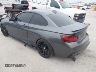 2014 BMW 2 Series M235i with VIN WBA1J7C57EVW84554, listed as a IAAI auction lot 41564175 with 121,632 mi miles and . Bid and sale history available at carsss.com. Image 3.