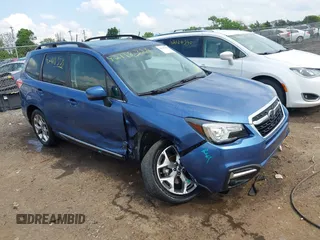 2017 Subaru Forester Touring with VIN JF2SJAWC7HH455648, listed as a IAAI auction lot 42118358 with 58,123 mi miles and . Bid and sale history available at DreamBid. Image 1.