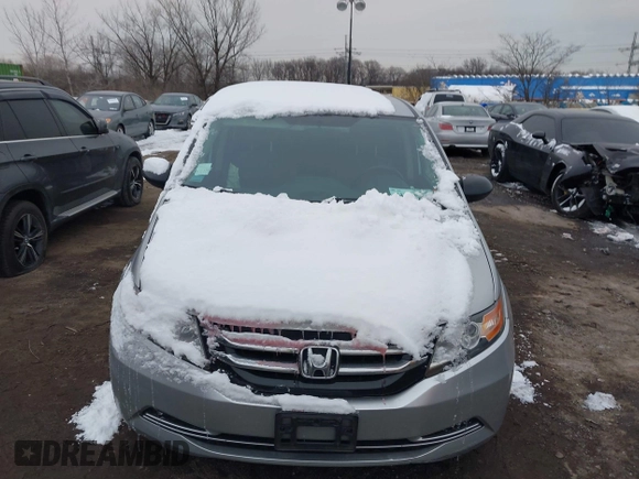 2014 Honda Odyssey LX with VIN 5FNRL5H22EB080346, listed as a IAAI auction lot 41282783 with 101,000 mi miles and . Bid and sale history available at carsss.com. Image 12.