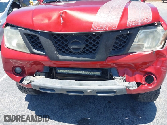 2015 Nissan Frontier SL with VIN 1N6AD0EV1FN711521, listed as a IAAI auction lot 42525352 with 203,114 mi miles and . Bid and sale history available at DreamBid. Image 6.