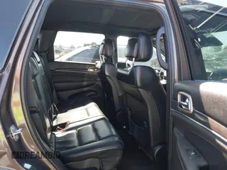 2017 Jeep Grand Cherokee Overland z VIN 1C4RJECG0HC960178, wystawiony jako IAAI lot #42315844 z przebiegiem 63 271 mil mil oraz . Historia ofert i sprzedaży dostępna na DreamBid. Obrazek 8.