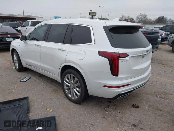 2021 Cadillac XT6 Premium Luxury z VIN 1GYKPCRSXMZ169206, wystawiony jako IAAI lot #41581841 z przebiegiem 64 789 mil mil oraz . Historia ofert i sprzedaży dostępna na DreamBid. Obrazek 3.