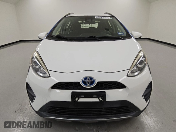 2018 Toyota Prius One z VIN JTDKDTB39J1600002, wystawiony jako Copart lot #53493975 z przebiegiem 87 147 mil mil oraz Czysty tytuł • Clean title. Historia ofert i sprzedaży dostępna na DreamBid. Obrazek 5.