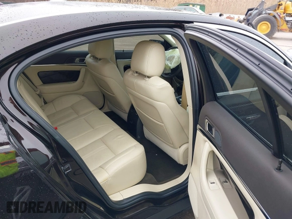 2014 Lincoln MKS with VIN 1LNHL9EK7EG609329, listed as a IAAI auction lot 41555819 with 89,849 mi miles. Bid and sale history available at carsss.com. Image 8.
