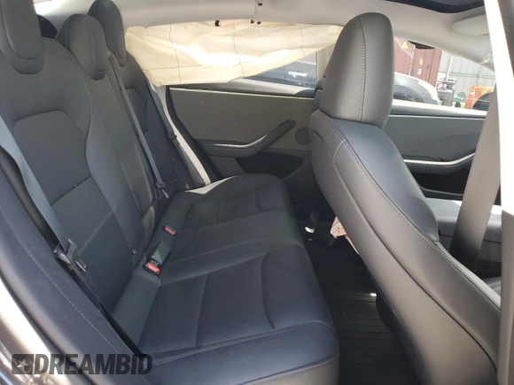2024 Tesla Model 3 z VIN 5YJ3E1EA1RF834301, wystawiony jako Copart lot #53305255 z przebiegiem 11 096 mil mil oraz Szkody całkowita. Historia ofert i sprzedaży dostępna na DreamBid. Obrazek 10.