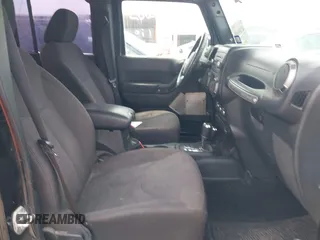 2014 Jeep Wrangler Unlimited Sport with VIN 1C4BJWDG0EL290441, listed as a IAAI auction lot 42204434 with 138,367 mi miles and . Bid and sale history available at DreamBid. Image 5.