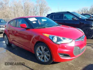 2016 Hyundai Veloster z VIN KMHTC6AD1GU260219, wystawiony jako IAAI lot #41114806 z przebiegiem 128 000 mil mil oraz . Historia ofert i sprzedaży dostępna na DreamBid. Obrazek 14.