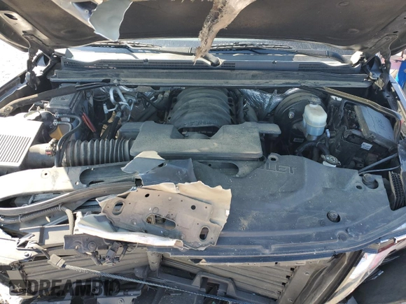 2017 Chevrolet Suburban LT z VIN 1GNSCHKC5HR329037, wystawiony jako Copart lot #52016315 z przebiegiem 215 859 mil mil oraz Szkoda całkowita • Salvage title. Historia ofert i sprzedaży dostępna na DreamBid. Obrazek 13.