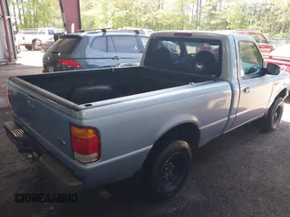 1998 Ford Ranger XL with VIN 1FTYR10C9WUC64490, listed as a IAAI auction lot 42108643 with 119,905 mi miles and . Bid and sale history available at DreamBid. Image 4.