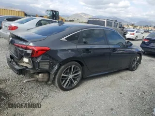 2024 Honda Civic Touring z VIN 2HGFE1F98RH336464, wystawiony jako Copart lot #50504775 z przebiegiem 14 655 mil mil oraz Szkoda całkowita • Salvage title. Historia ofert i sprzedaży dostępna na DreamBid. Obrazek 3.