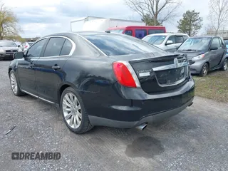 2011 Lincoln MKS EcoBoost with VIN 1LNHL9FTXBG600398, listed as a IAAI auction lot 42047512 with 114,274 mi miles and . Bid and sale history available at DreamBid. Image 3.