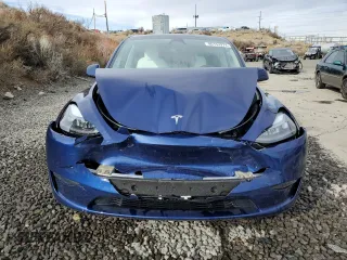 2024 Tesla Model Y Long Range с VIN 7SAYGDEE5RF983771, выставлен на аукционе Copart как лот 86153274 с пробегом 4 105 миль миль и Списание • Salvage title. История ставок и продаж доступна на DreamBid. Изображение 5.