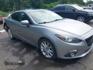 2014 Mazda 3 S Grand Touring z VIN JM1BM1W36E1197617, wystawiony jako IAAI lot #42250428 z przebiegiem 198 303 mil mil oraz . Historia ofert i sprzedaży dostępna na DreamBid. Obrazek 1.