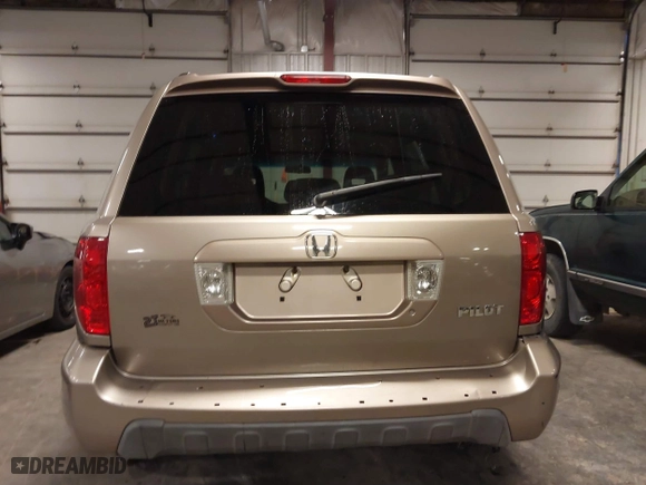 2004 Honda Pilot EX with VIN 2HKYF18464H567384, listed as a IAAI auction lot 41790773 with 142,534 mi miles. Bid and sale history available at carsss.com. Image 17.