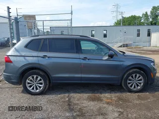 2018 Volkswagen Tiguan S with VIN 3VV0B7AX5JM108306, listed as a IAAI auction lot 42741783 with 71,040 mi miles and . Bid and sale history available at DreamBid. Image 13.