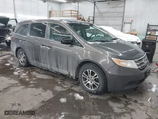 2012 Honda Odyssey EX-L with VIN 5FNRL5H66CB101151, listed as a IAAI auction lot 41504250 with 261,836 mi miles. Bid and sale history available at carsss.com. Image 1.