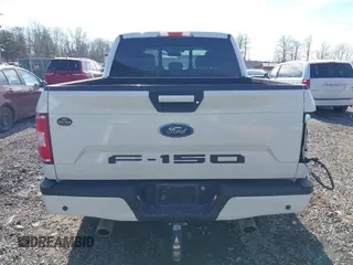 2018 Ford F-150 XL with VIN 1FTEW1E5XJFE20779, listed as a IAAI auction lot 41705616 with 138,996 mi miles and . Bid and sale history available at DreamBid. Image 16.