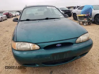 1997 Ford Escort LX with VIN 1FALP13P8VW264150, listed as a Copart auction lot 87328394 with 127,934 mi miles and Salvage Title. Bid and sale history available at carsss.com. Image 5.